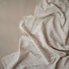 Mushie swaddle falling stars 1