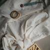 Mushie swaddle sun 3
